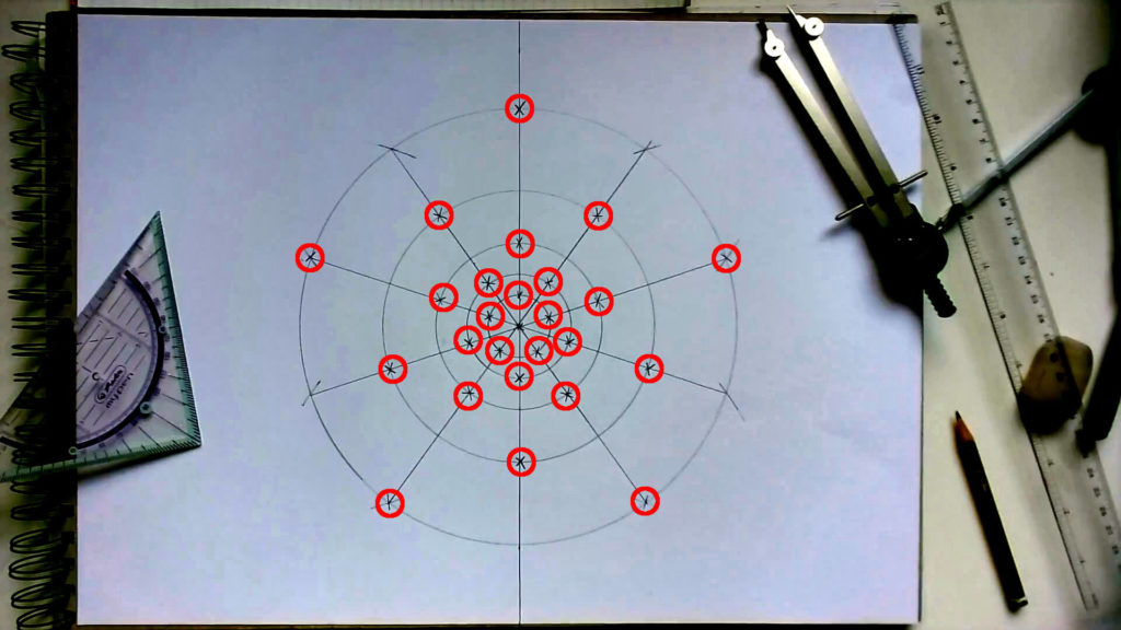 Bild von Kreisen und Geraden, deren Überschneidungen rot markiert sind. Anleitung: Eine Venusblume zeichnen